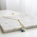 Colar Dourado com Pérolas Naturais e Pedra Azul Banho de Ouro