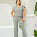 Conjunto plus size brilhante com lurex de calça e blusa com manga soltinha