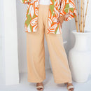 Calça alfaiataria feminina plus size lisa na cor bege